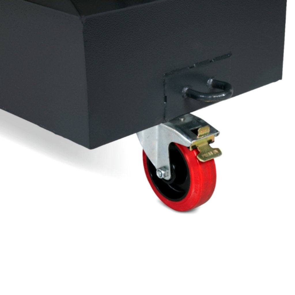 Close up of a red wheel of a black armorgard rubble truck on a white background