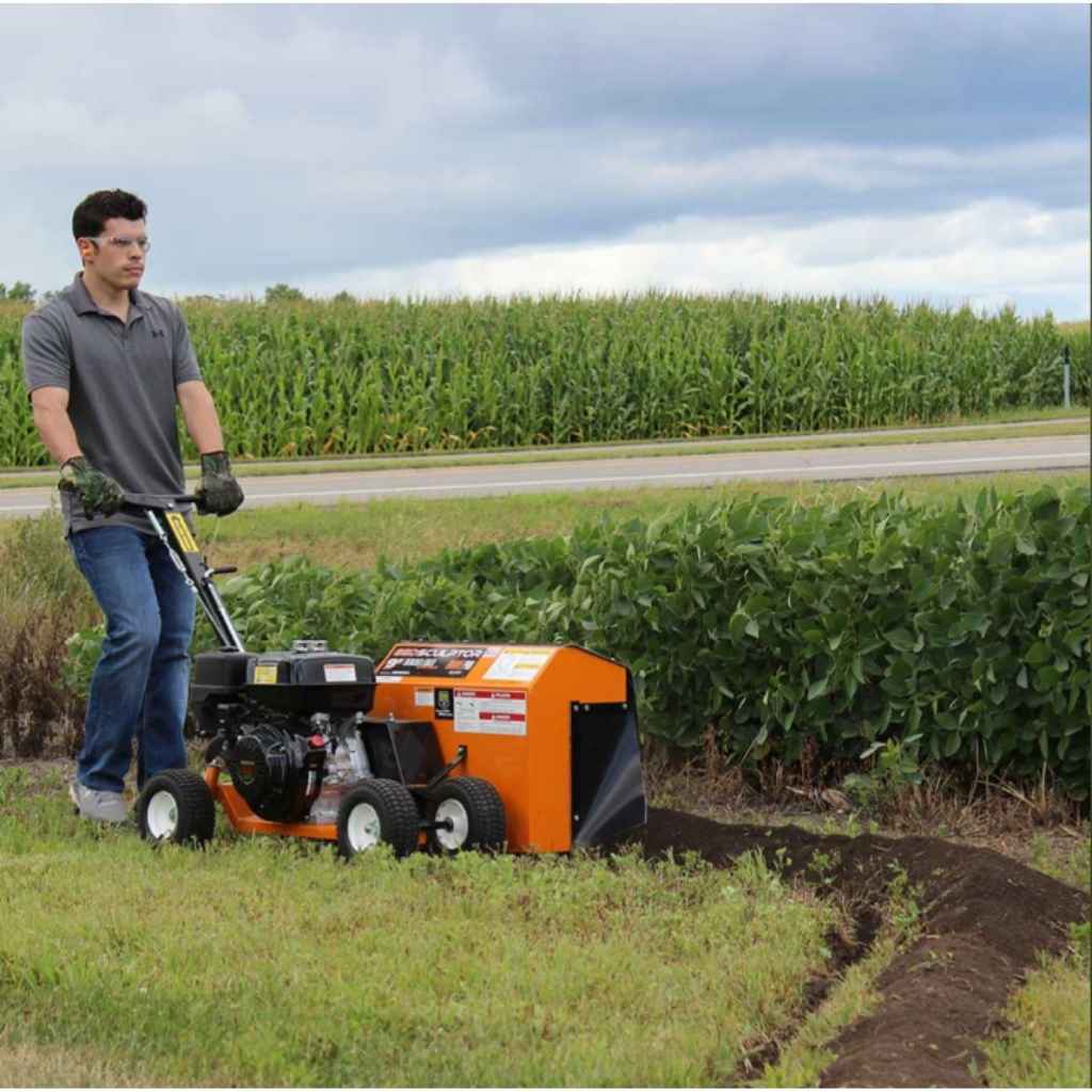 Man operating a brave 5 inch bed edger in a field with corn in the background