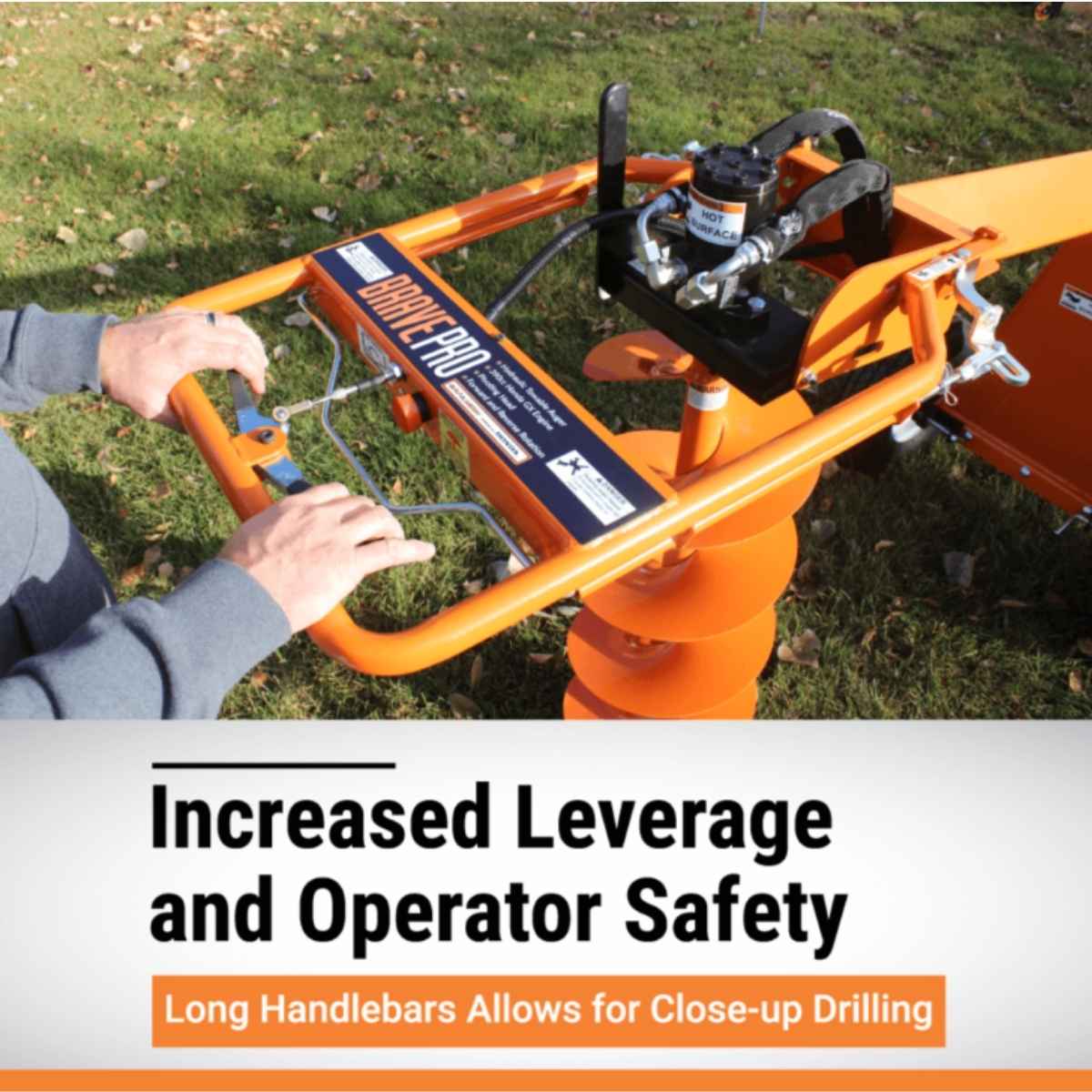 Orange Brave pro hydraulic Towable Auger with long handlebars on grass, labeled 'Brave Pro'.