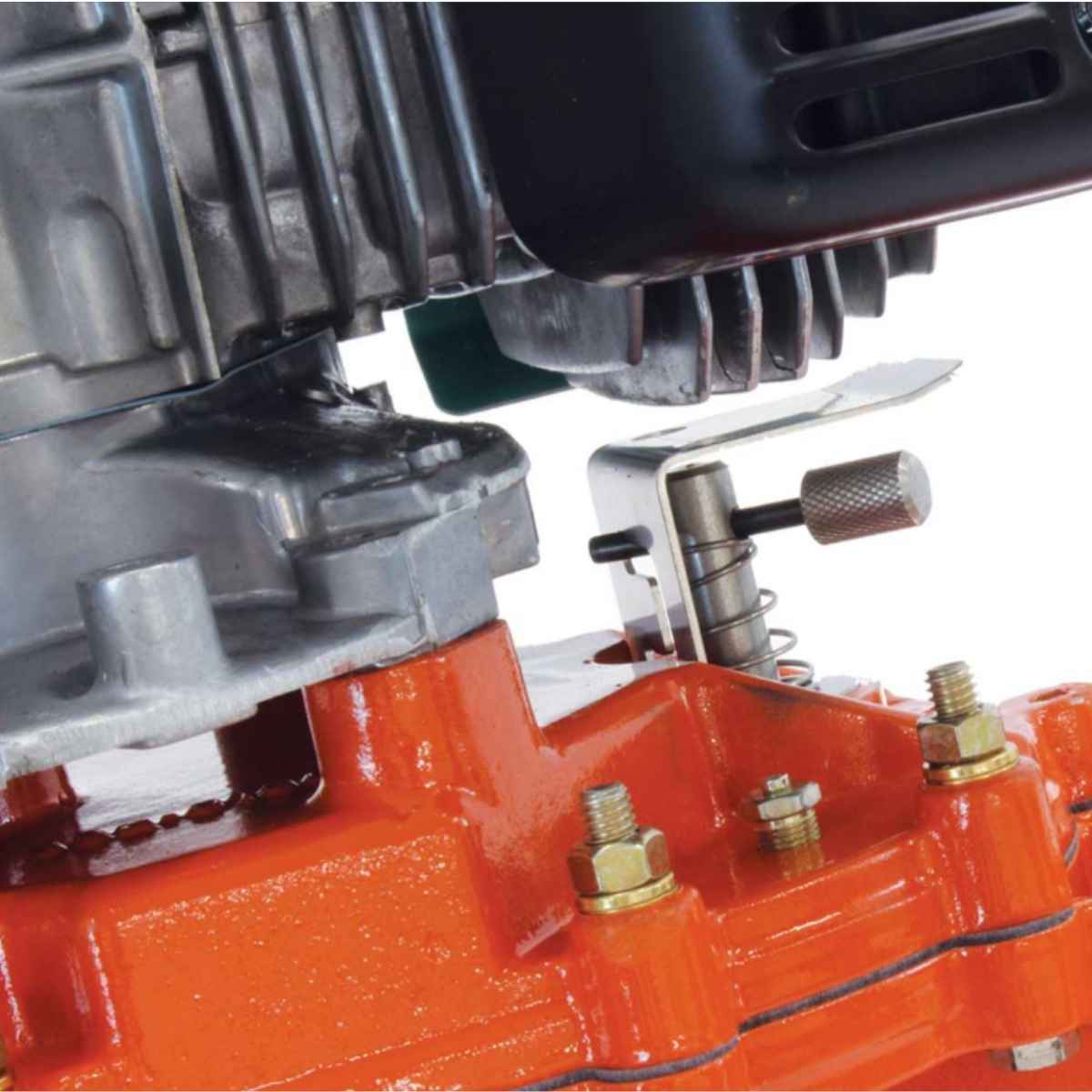 Close-up of a bravepro two man auger with red and metallic parts.