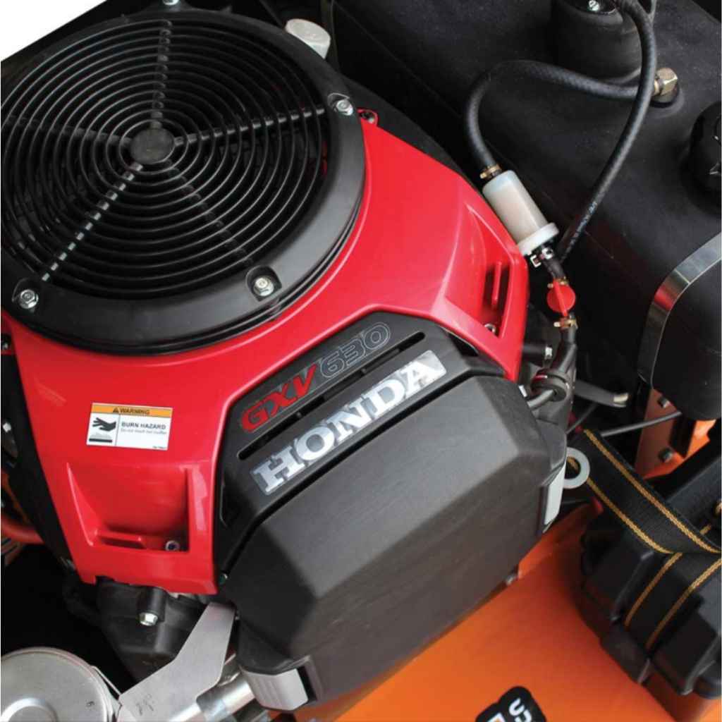 Close-up of a Honda GXV 650 engine on a brave 60 inch tow behind finish cut mower