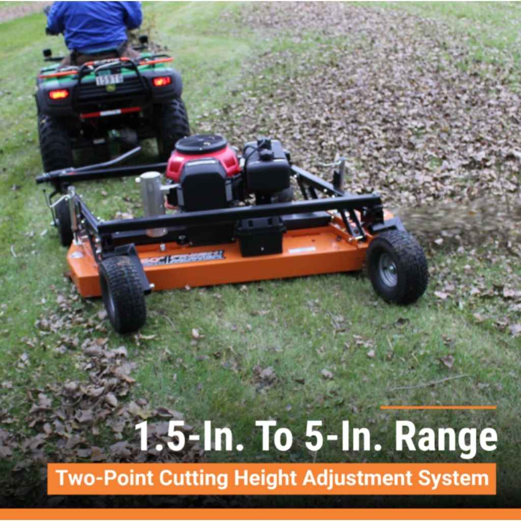 brave 60 inch tow behind mower with two-point cutting height adjustment system on grass