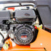 Close-up of a Brave plate compactor BRPFP135H with a Honda GX engine on a piece of machinery.