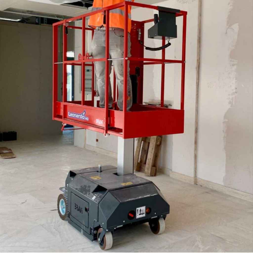 person standing on a bravi leonardo hd in a warehouse setting