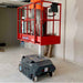 person standing on a bravi leonardo hd in a warehouse setting