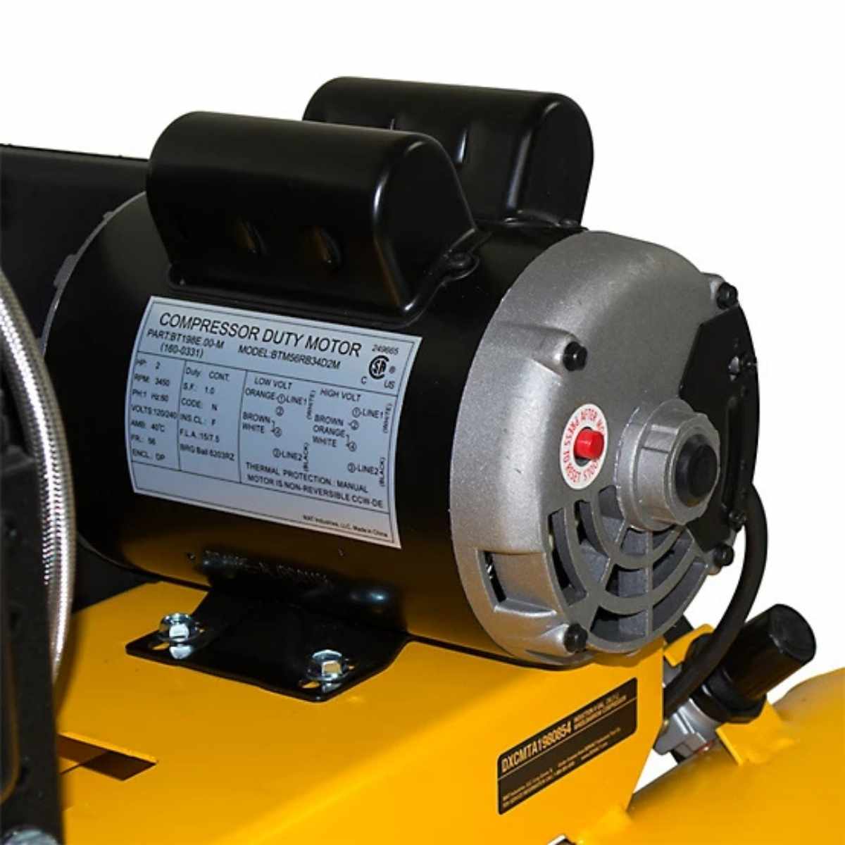 Motor with label on a yellow DeWalt 8 gallon 5.7 cfm air compressor, likely part of a larger equipment or machinery component.