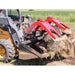 Skid steer loader with red greywolf double quick grapple skid steer sttachment working in a field