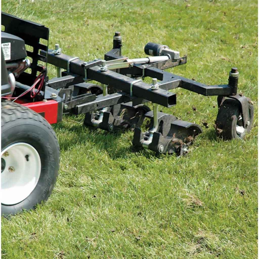 Jrco tow behind 38 inch hooker aerator on a grassy field