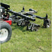 Jrco tow behind 38 inch hooker aerator on a grassy field