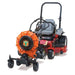 Red riding lawn mower with a jrco blower buggy 601 front mount with an orange Leaf Blower on a white background