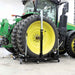 Tractor tire on a k and m 3800 lb wheel dolly in a workshop setting