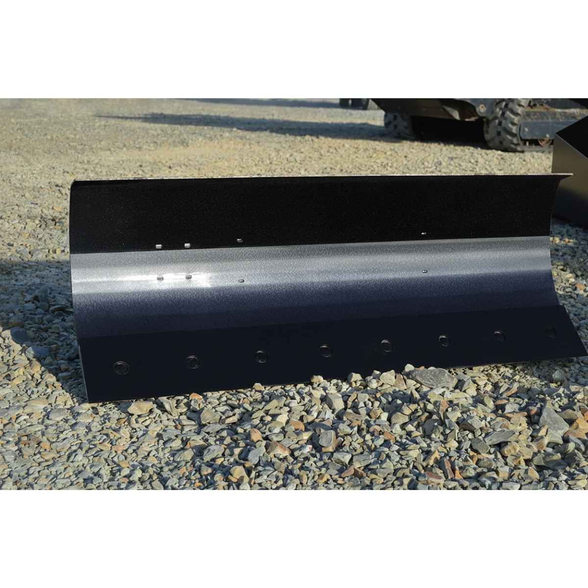 Black Loflin Mini Skid Steer Dozer Blade on a gravel surface
