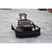 A black LOFLIN heavy-duty mini excavator brush cutter attachment,  photographed on a gray concrete floor.