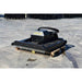 A black LOIFLIN fabrication mini skid steer brush cutter mounted on a wooden pallet, photographed outdoors on a concrete surface.