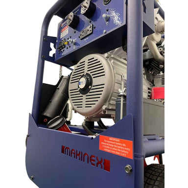 A close-up of a Makinex 240v 16 Kw generator showing the blue frame, silver engine components, control panel, and red warning label.