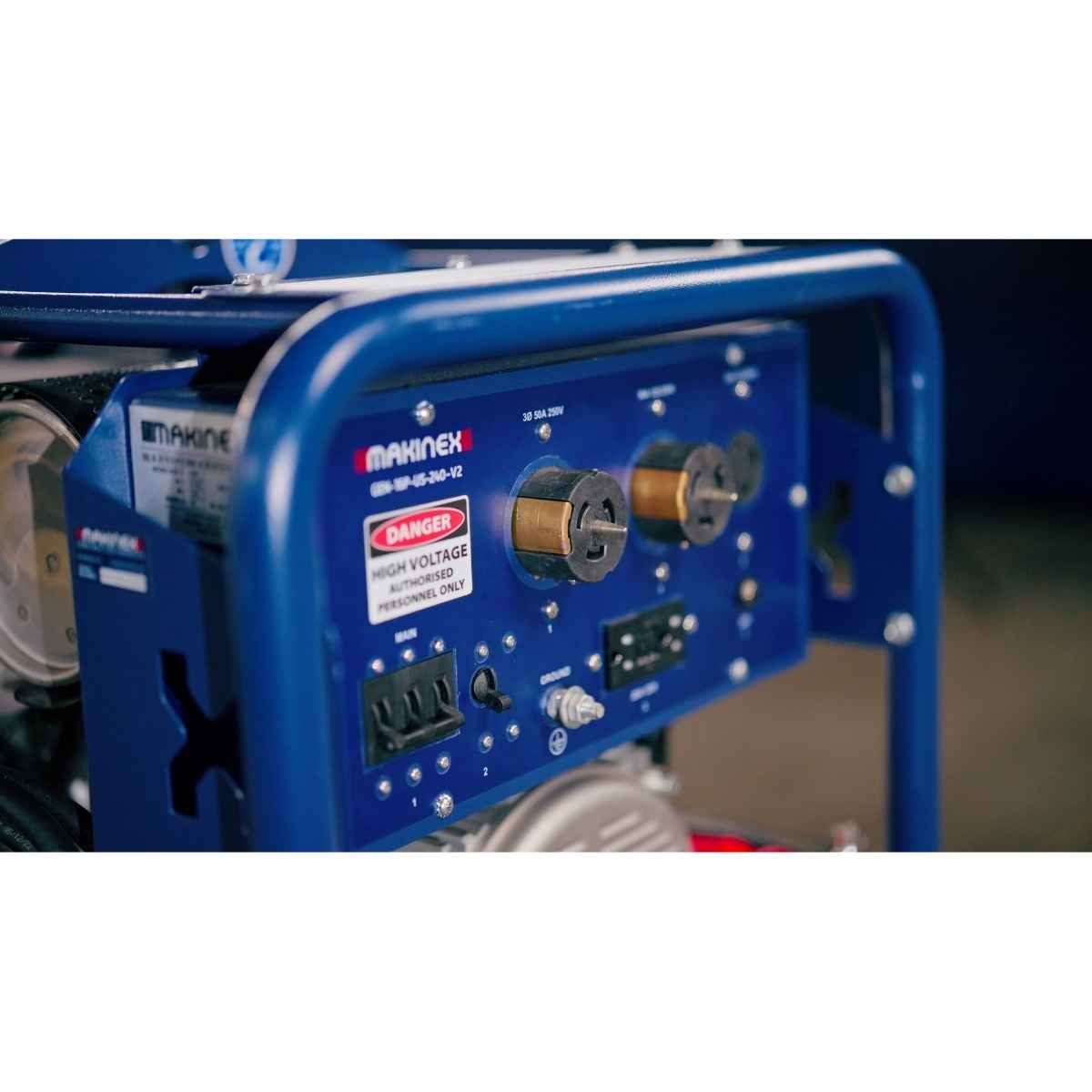 Close-up of a blue Marinex 240v 23kw portable generator showing the control panel with outlets, switches, and outlets, with a white and red Marinex logo on the blue metal panel.