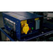Blue and yellow Makinex Generator 32 Kw 480 volt Control panel in a factory setting.