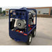 Blue makinex gen 16p ms 480 on a concrete surface with a building in the background