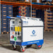 Makinex Portable power box with Makinex branding in a warehouse setting