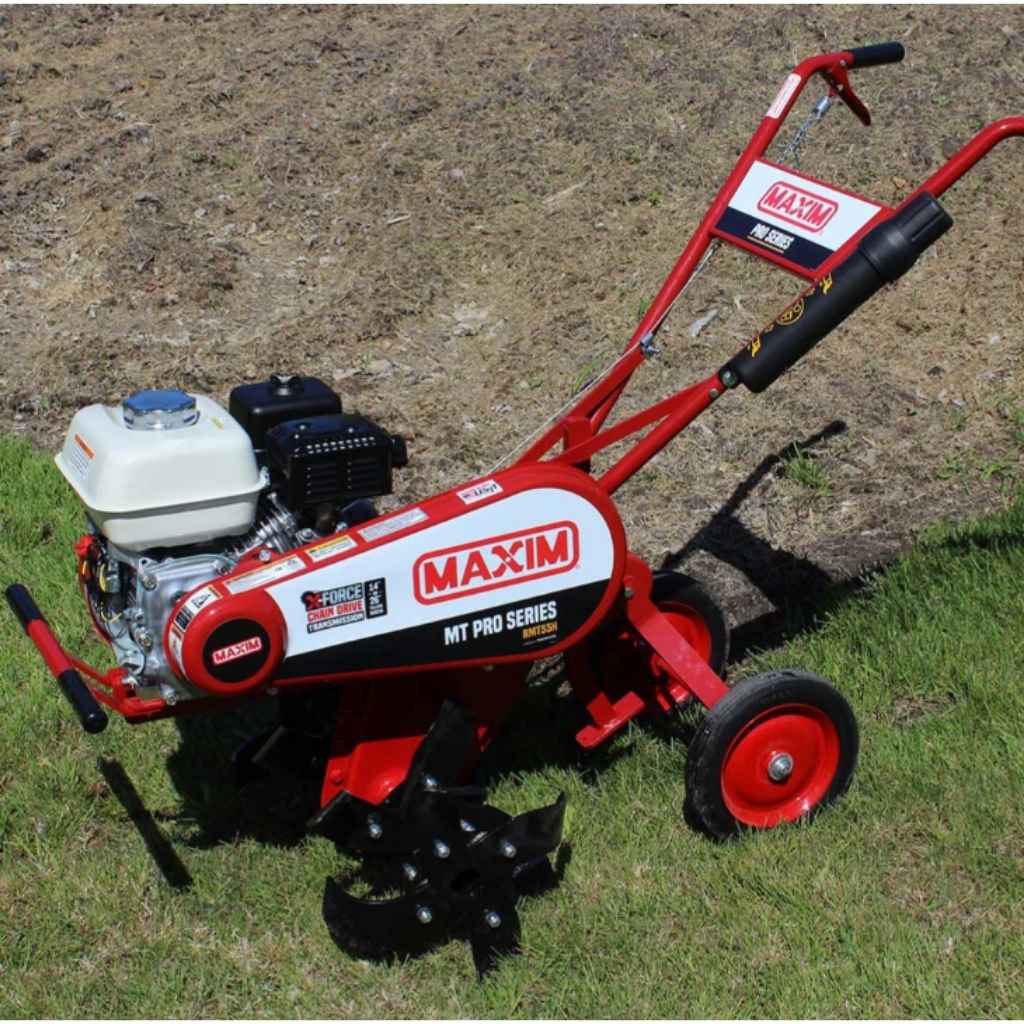 Red and white Maxim RMT55H tiller on a grassy field