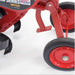 Red maxim 26 inch commercial tiller with black wheels on a white background