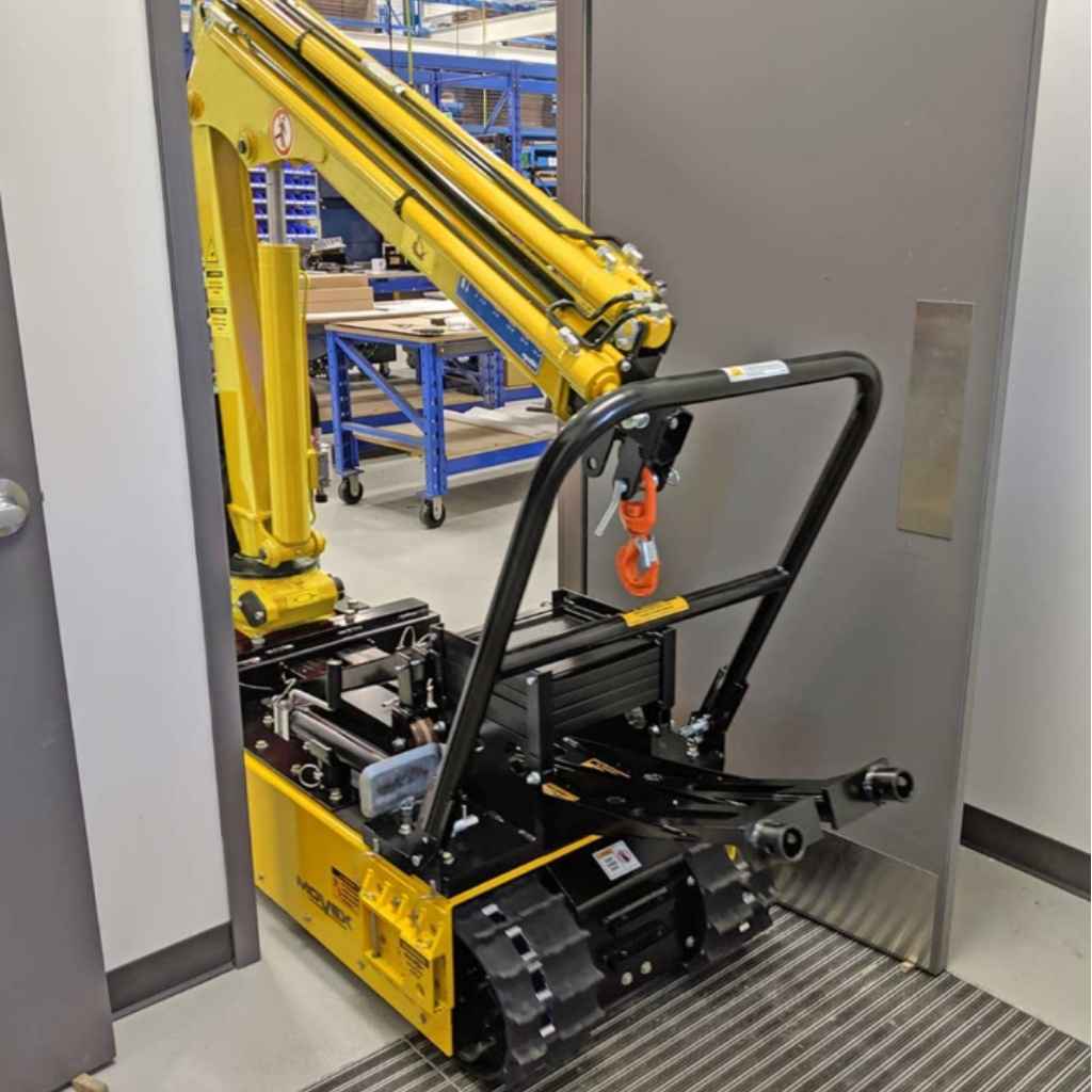 Yellow and black movex tt 270 crane in a factory setting