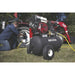 Person using a NorthStar 20 gal gas air compressor on a lawn.