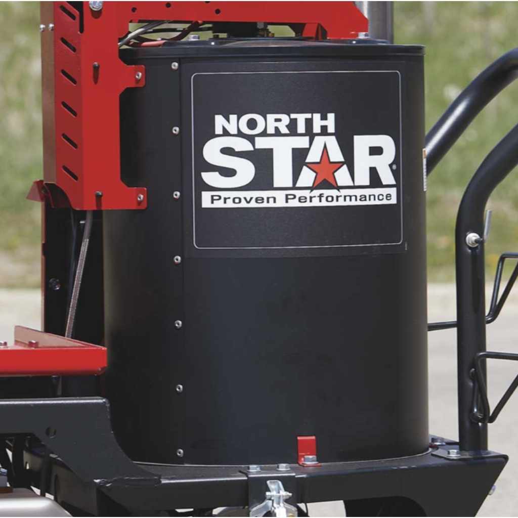 close up of the tank to a northstar hot water pressure washer 2750 psi with trees in the background.