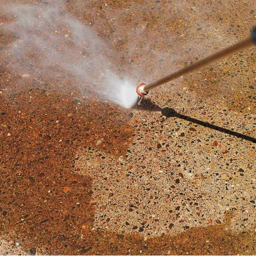 northstar hot water gx390 Pressure washer 3500 psi cleaning a concrete surface with rust removal visible