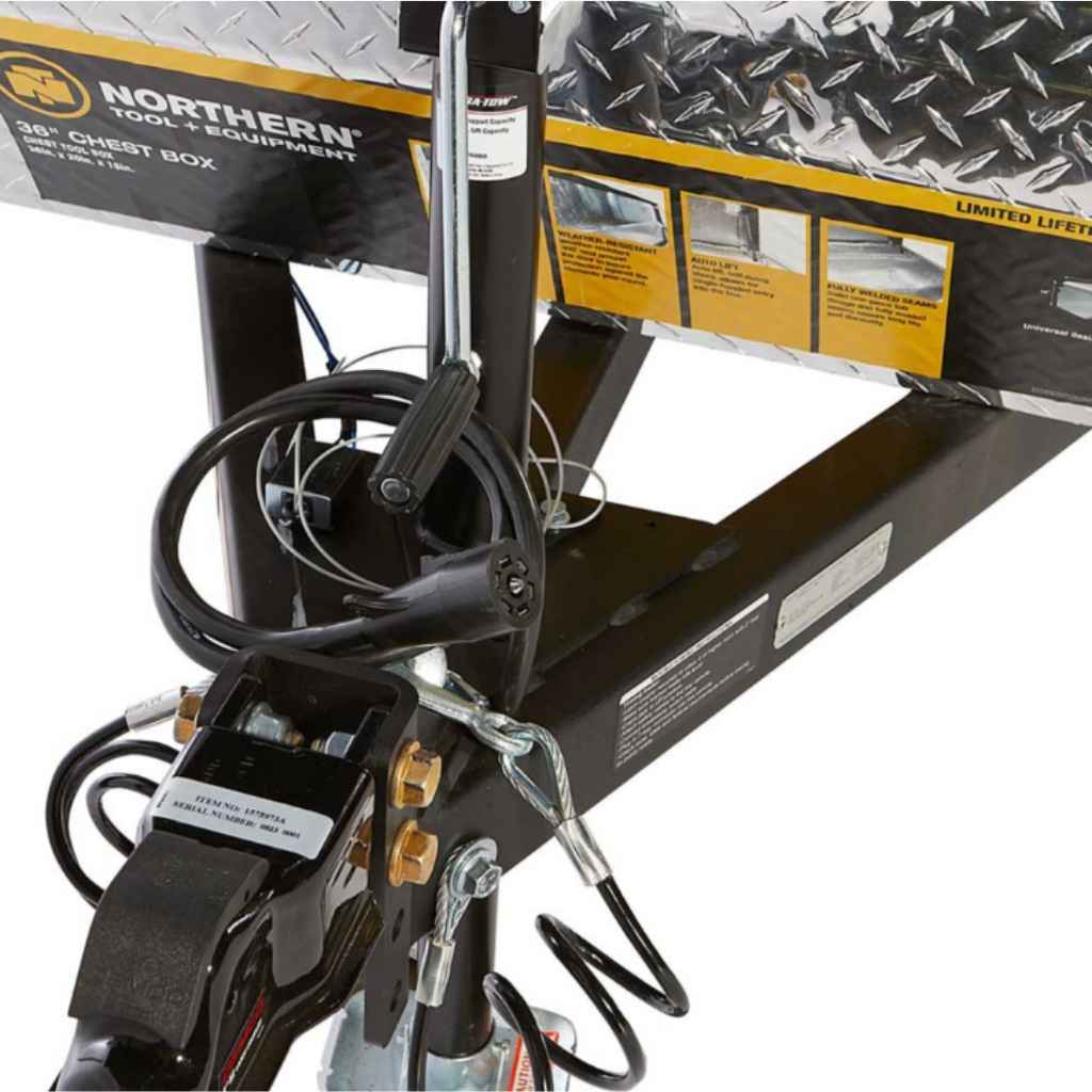 Close-up of a Northern Tool & Equipment chest box on a northstar 400 psi hot water pressure washer with a tool rack and attachments.