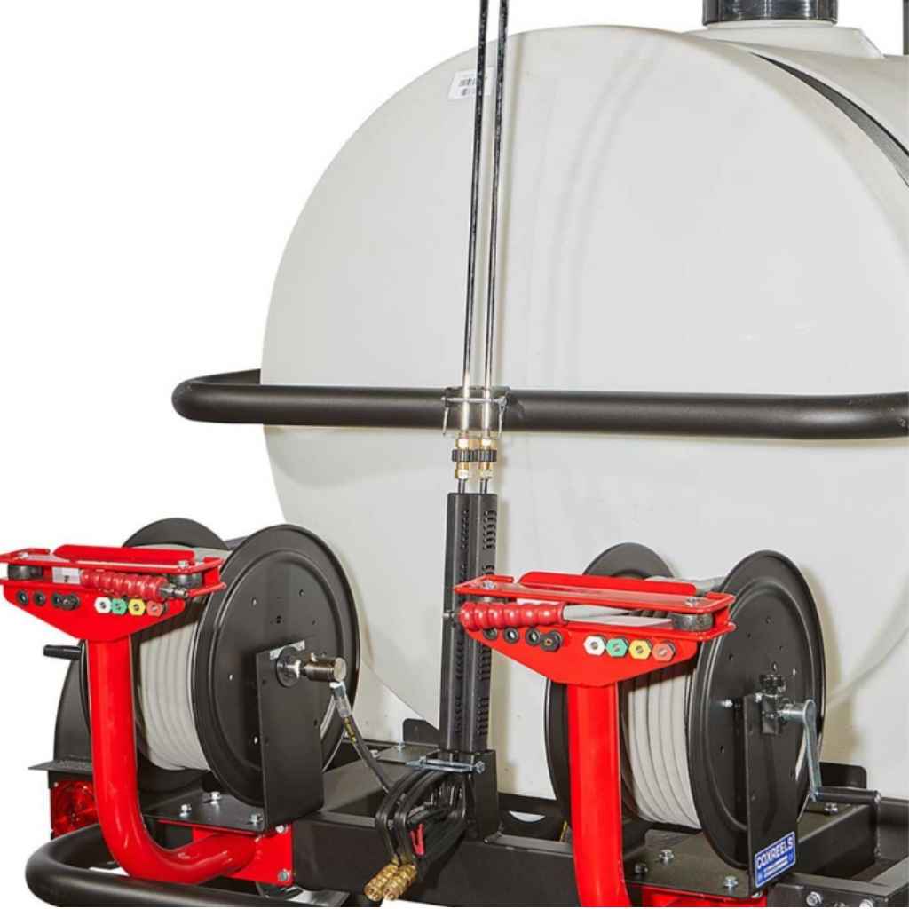 Close-up of a northstar 400 psi hot water pressure wasehr trailer with a white cylindrical tank with red and black mechanical components on a white background