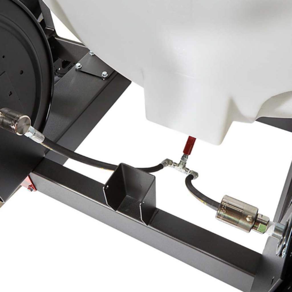 Close-up of a northstar 4000 psi terailer mounted hot water pressure washer mechanical component with a white container and metal parts on a white background