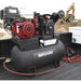 NorthStar 30 gal air compressor with engine on a truck bed, construction site in the background