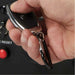 Hand holding a powerhorse 8000 watts generator key fob with a blurred background