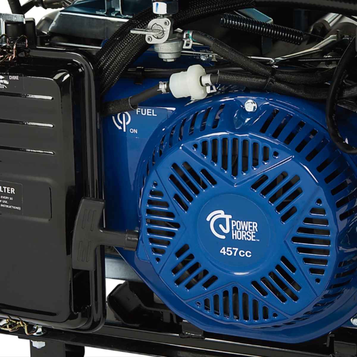 Close-up of a PowerHorse 12500 watt generator power horse engine with blue fan and visible branding.