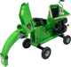 Green Yardbeast 3514 Woodchipper on a transparent background mouth view with chute opened so the blade is exposed and the logo is int the side with the yardbeast lettering on the side