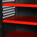 Red metal shelf with to an armorgard fittingstor with perforated black panel on a dark background
