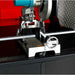 armorgard ss7 cutting station in operation on a workshop table with red and black background
