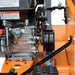 Close-up of a brave pro 7 trencher engine on an orange machine with visible branding.
