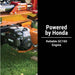 brave 24 ton log splitter with Honda engine on grass, featuring 'Powered by Honda' text.