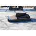 A heavy-duty black closed front loflin fabrication brush cutter attachment, likely a loader bucket or scraper blade, resting on a concrete surface outdoors.