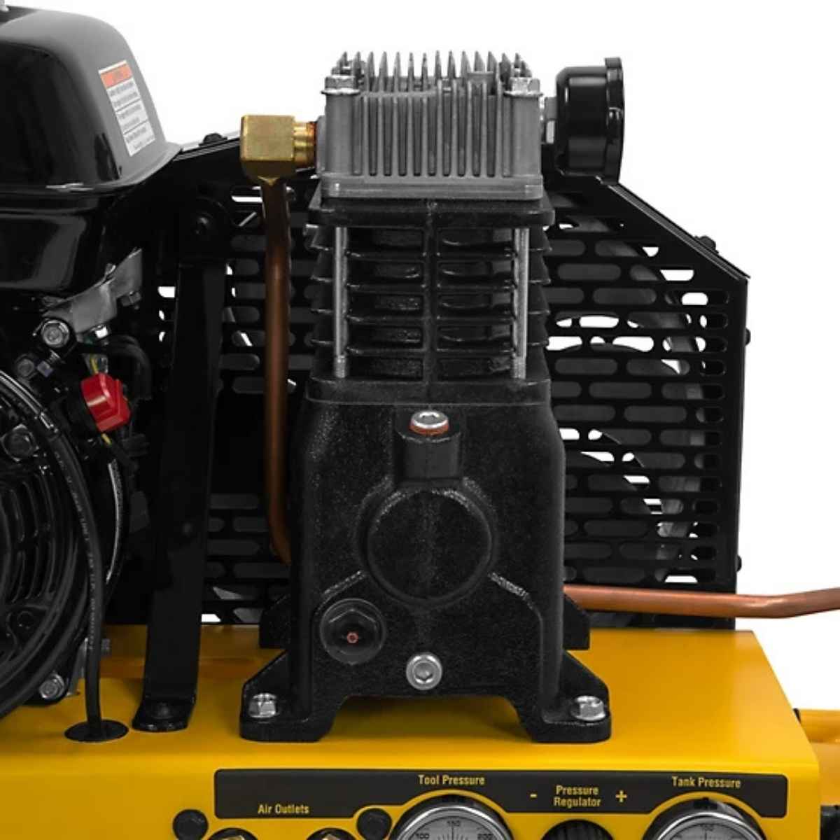 Close-up of a black air compressor on a yellow dewalt 8 gal wheelbarrow gas air compressor with a white background