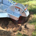 dosko 13-hp Stump grinder removing a tree stump from the ground