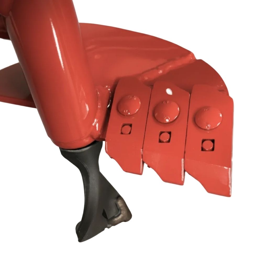 Close-up of a red metal component with black plastic part of a groundhog model one auger on a white background