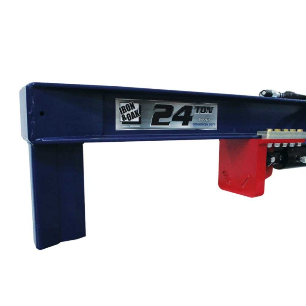 Blue and red iron and oak 24 ton skid mount log splitter close up view of jaws with branding that says iron and oak 24 ton. on a white background