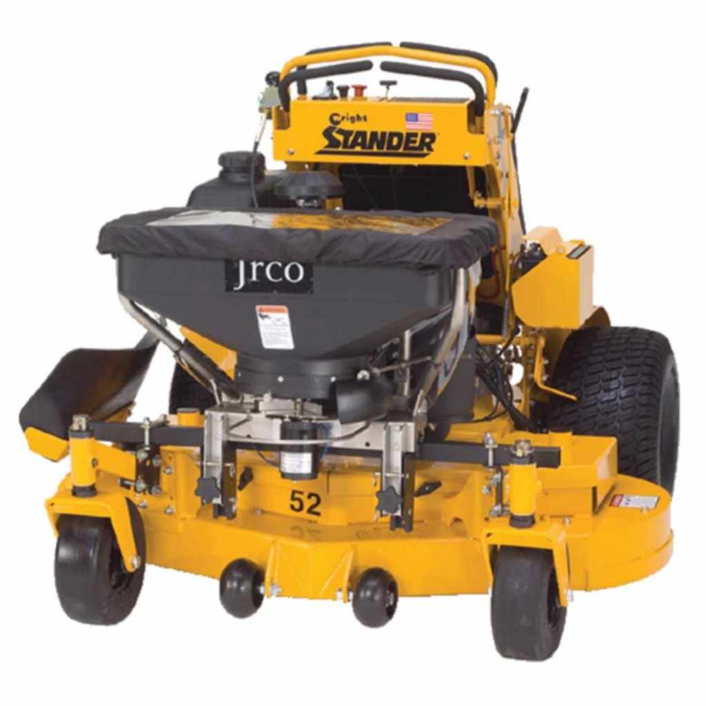 Yellow stand-on lawn mower with a jrco broadcast spreader cable control on a white background