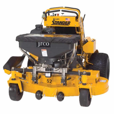 Yellow stand-on lawn mower with a jrco broadcast spreader cable control on a white background