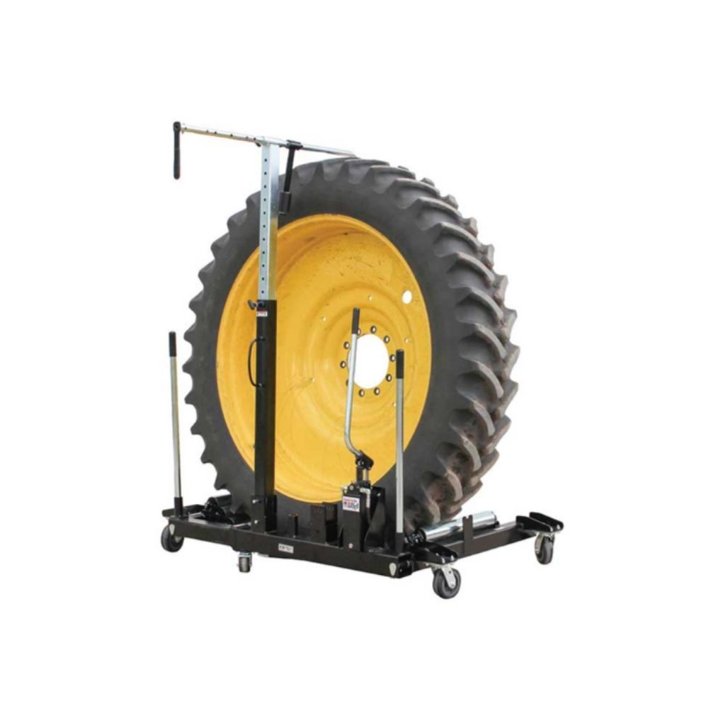 Large yellow tire on a black k & m wheel dolly with wheels on a white background