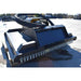 A Black loflin fabrication closed front brush cutter with multiple hanging silver steel chains along the front edge, photographed outdoors on a concrete lot.