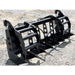 Black loflin compact tractor vertical root grapple attachment on a gravel surface